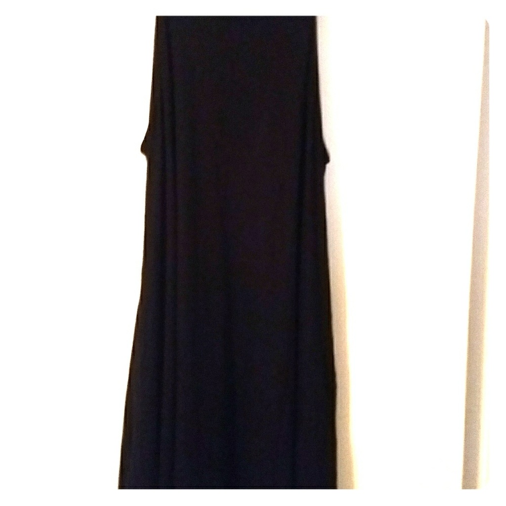 Black dress with side pockets.